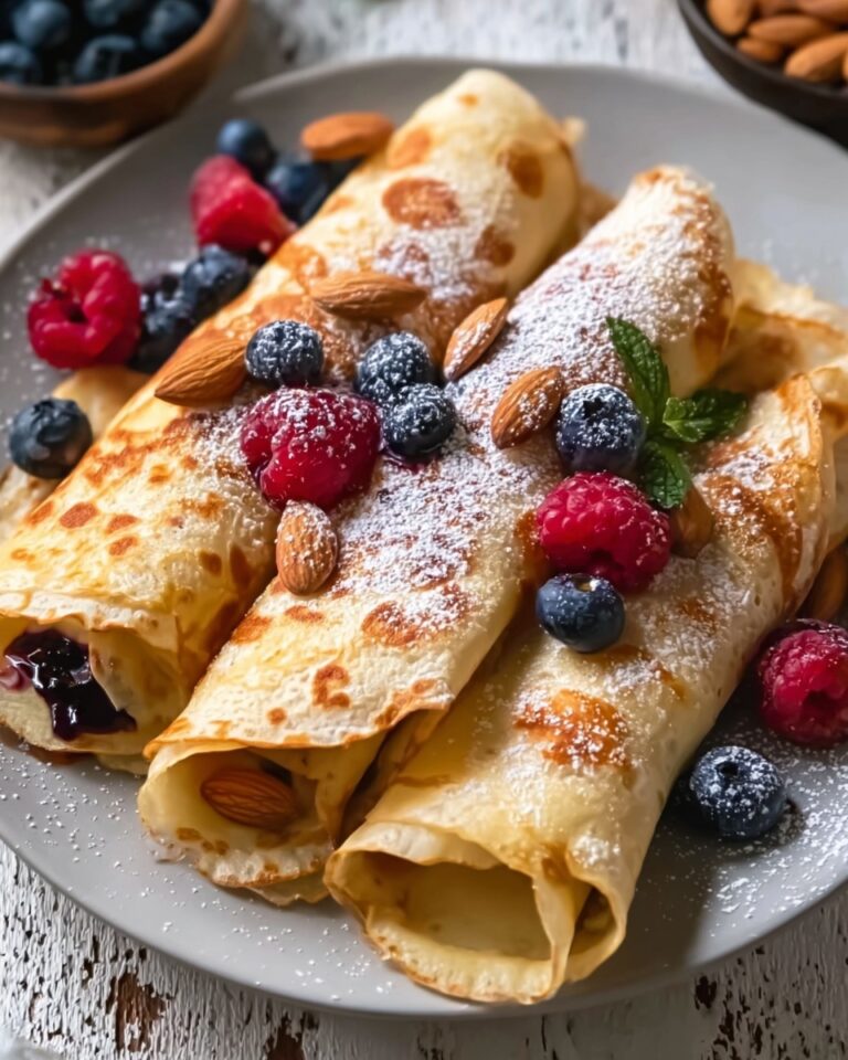 Almond Crepes with Warm Berries Recipe